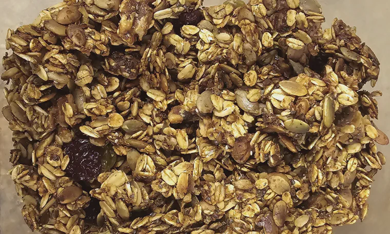 Finished lemon chia granola in a glass jar